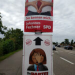 Foto von 2 Wahlplakaten der Bundestagswahl 2012